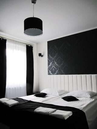 Мотели Słowianin Modliszewko Улучшенный двухместный номер с 2 отдельными кроватями-7